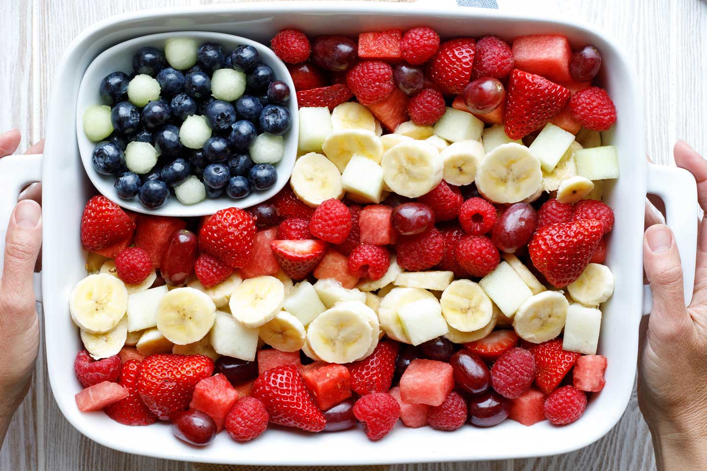 Colorful fruit salad flag display