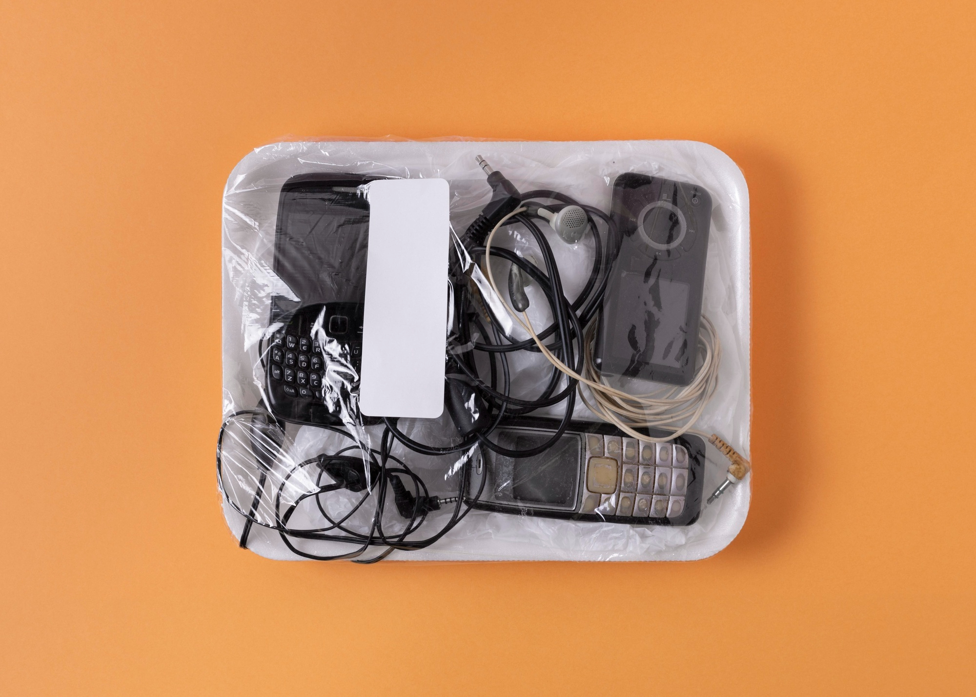 Old electronic devices in packaging