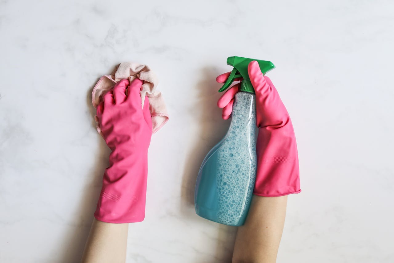 A Person Using Cleaning Products
