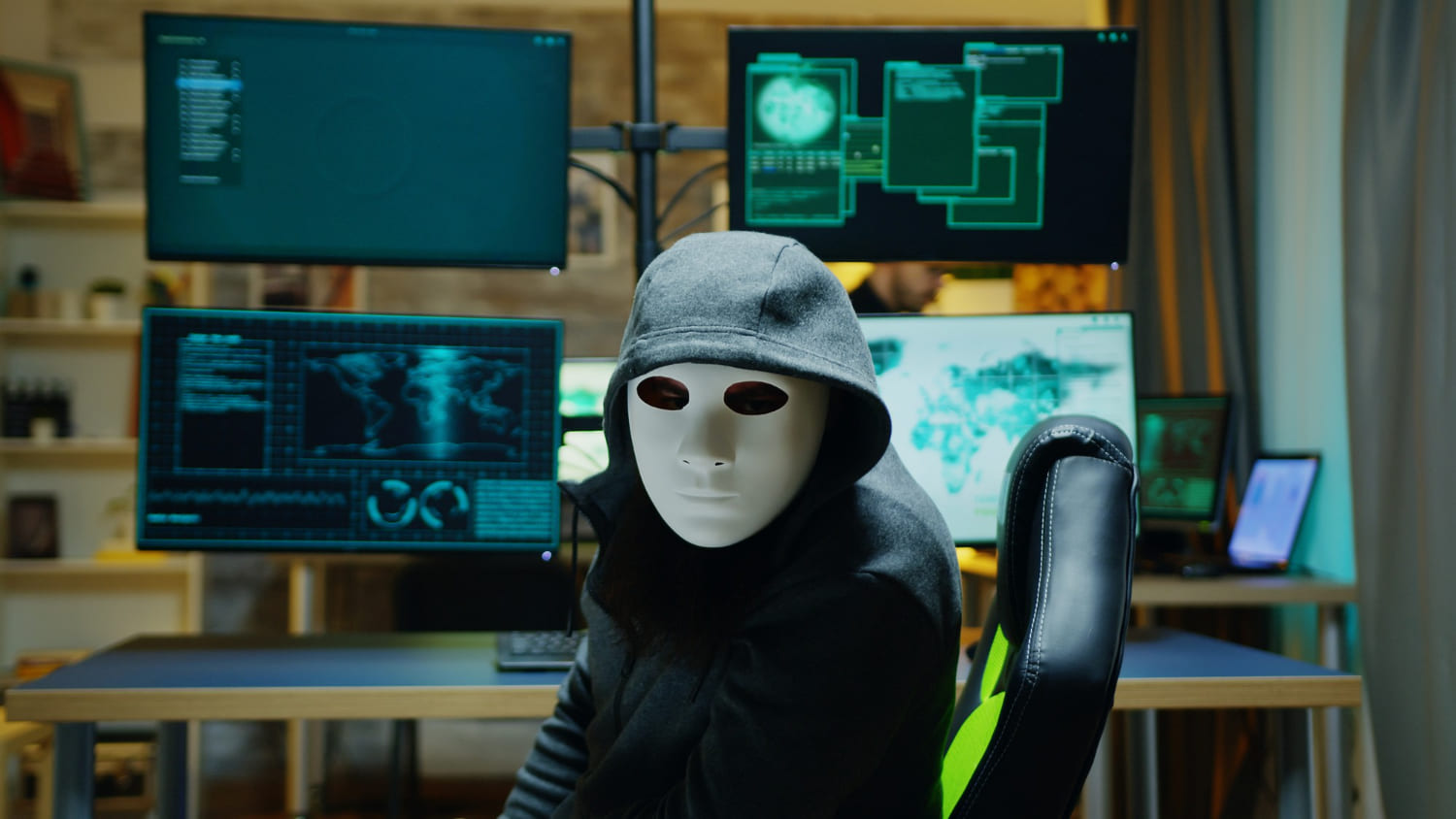 Masked hacker wearing a hoodie