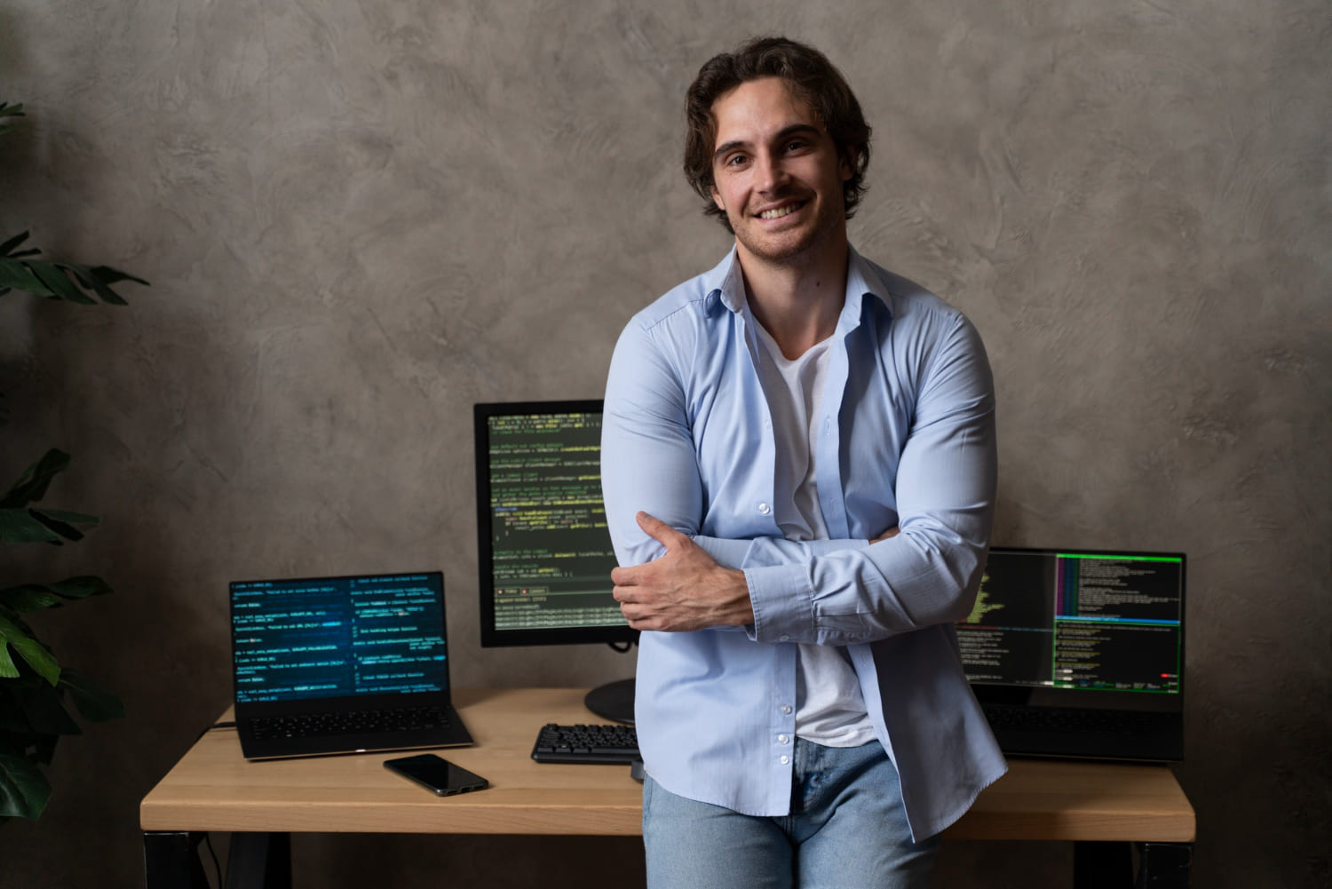 Medium shot of a smiling programmer indoors